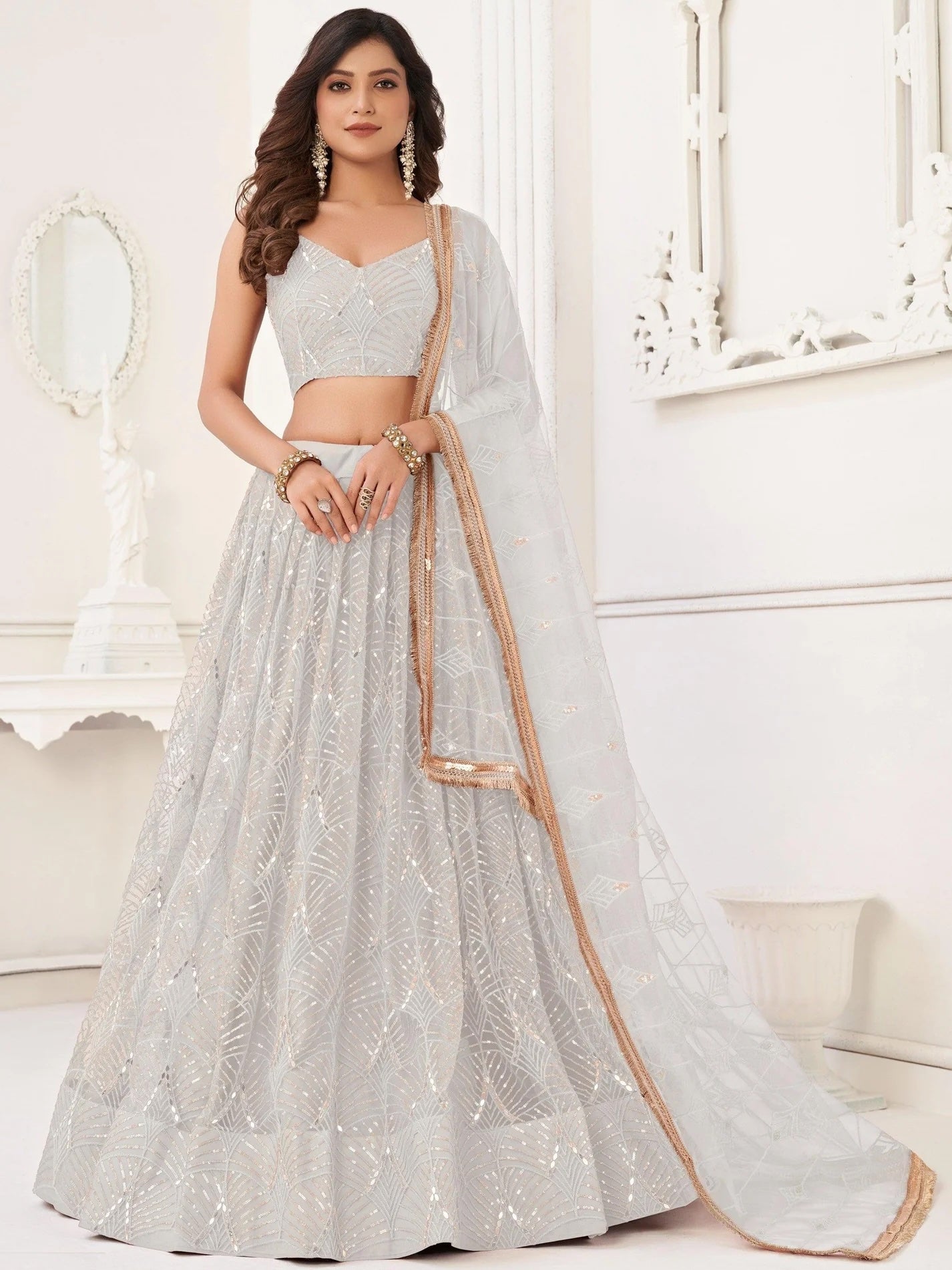 Stunning Off-White Sequins Net Wedding Wear Lehenga Choli With Dupatta