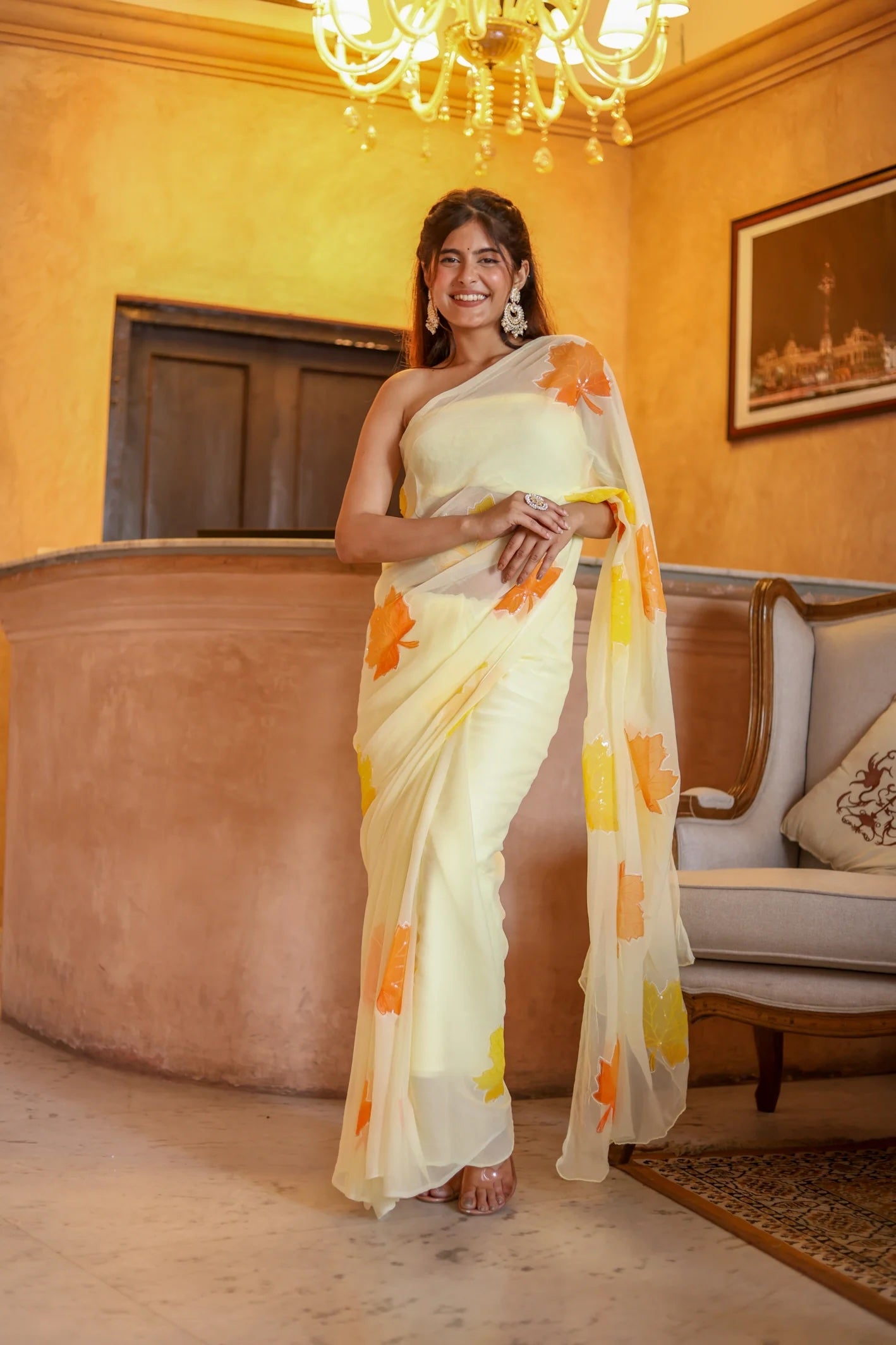Radiate Elegance in the Sunlit Maple Embroidered & Handpainted Chiffon Saree Design