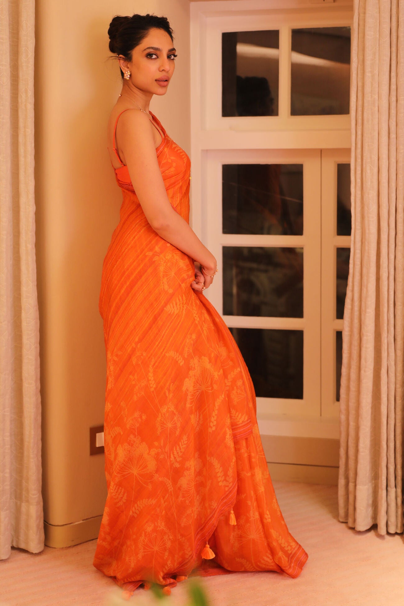 Sobhita Dhulipala in Classic Orange Floral Print Meora Saree
