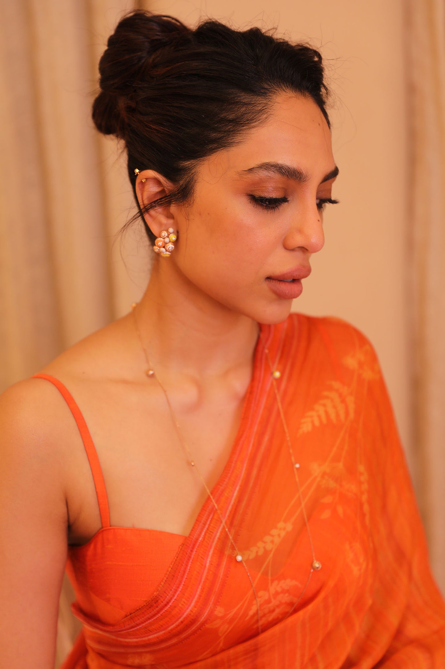 Sobhita Dhulipala in Classic Orange Floral Print Meora Saree
