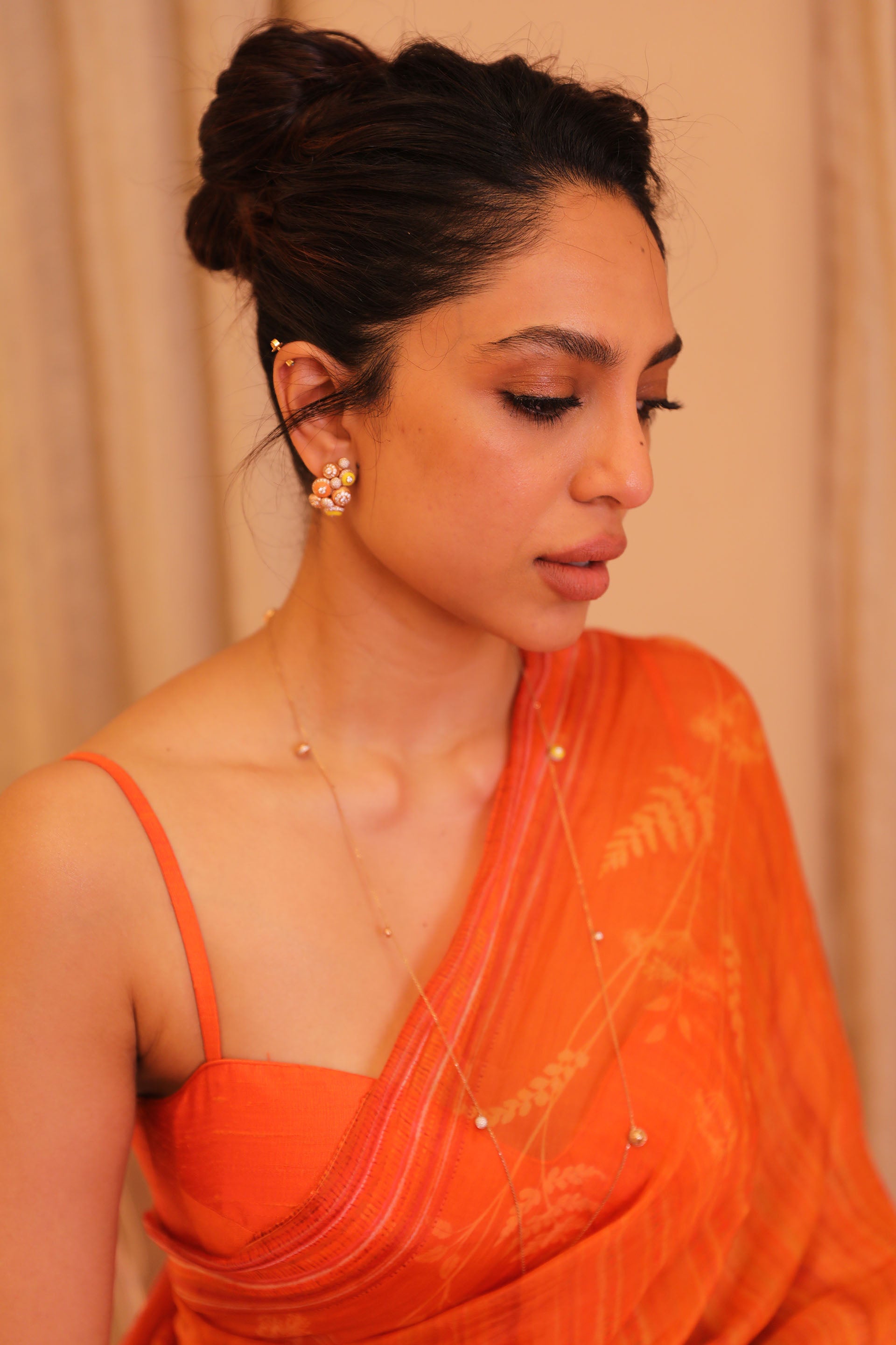 Sobhita Dhulipala in Classic Orange Floral Print Meora Saree