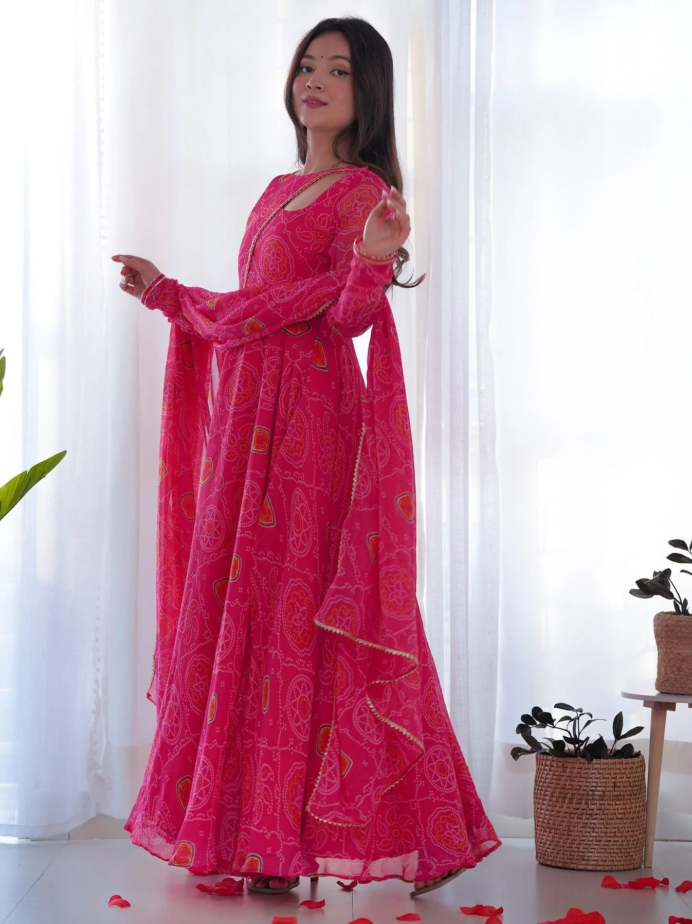 pink bandhani dress Lovely Pink Bandhani Print Georgette Gown with Sheer Sleeves and V-Nec Mangaldeep NX