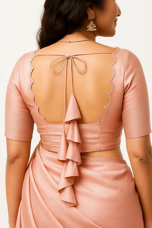 Peach satin blouse with scalloped back neck and layered dori tie design.