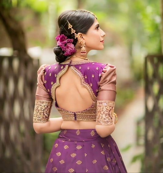 Purple silk embroidered blouse with golden detailing and designer cutwork back neck style.