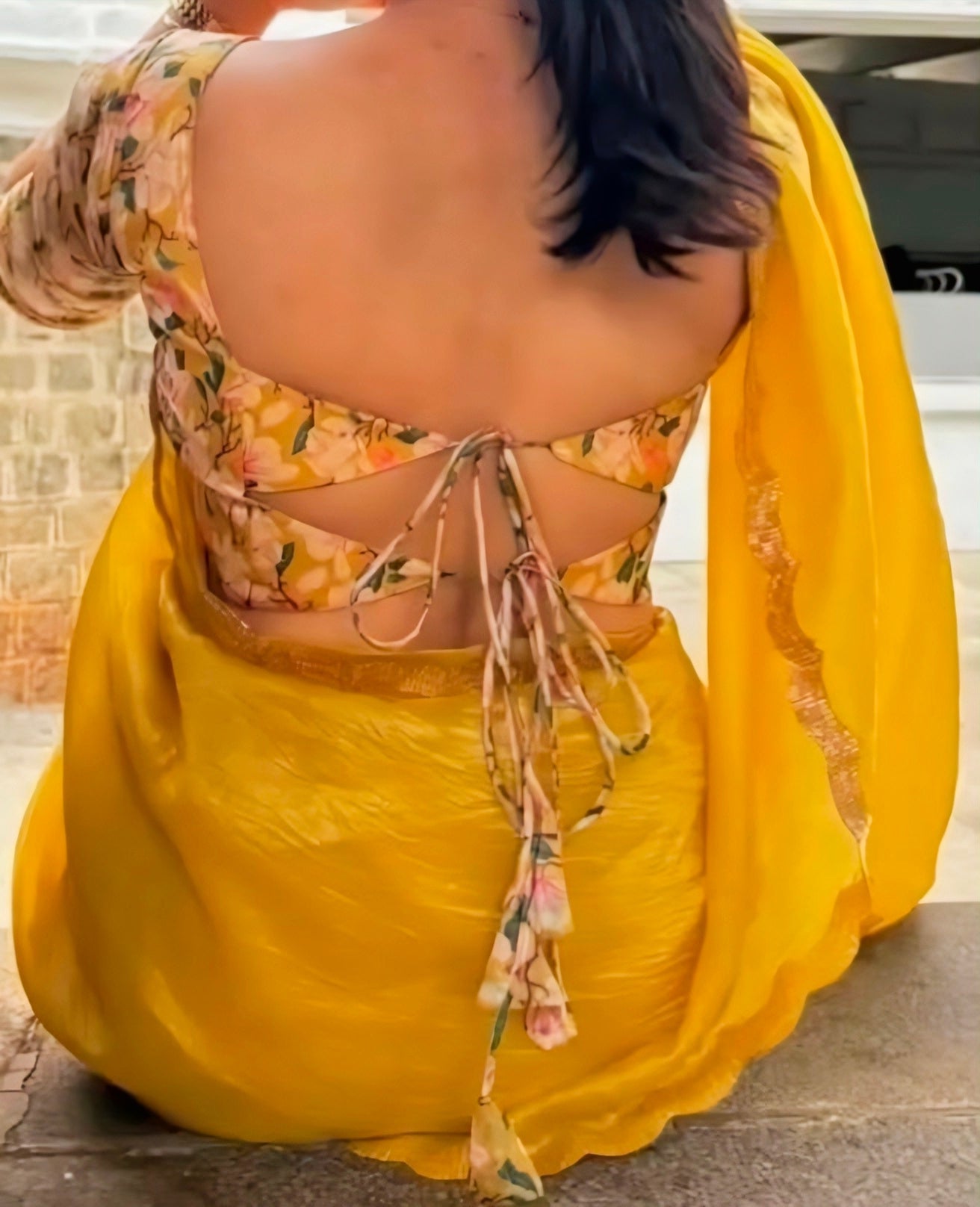 Yellow floral print back-tie deep-back blouse design for saree