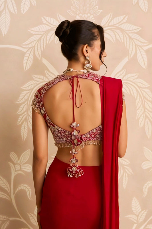 Red embroidered round back-neck blouse with dori and heavy latkan detailing