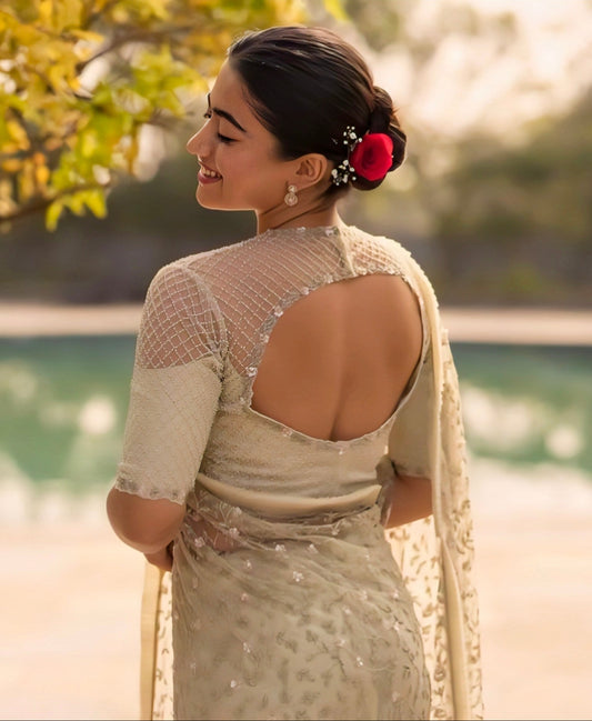 Elegant net-yoke back-neck blouse design in pastel color with open-back style – Saree blouse inspiration by Rimzim Fashion
