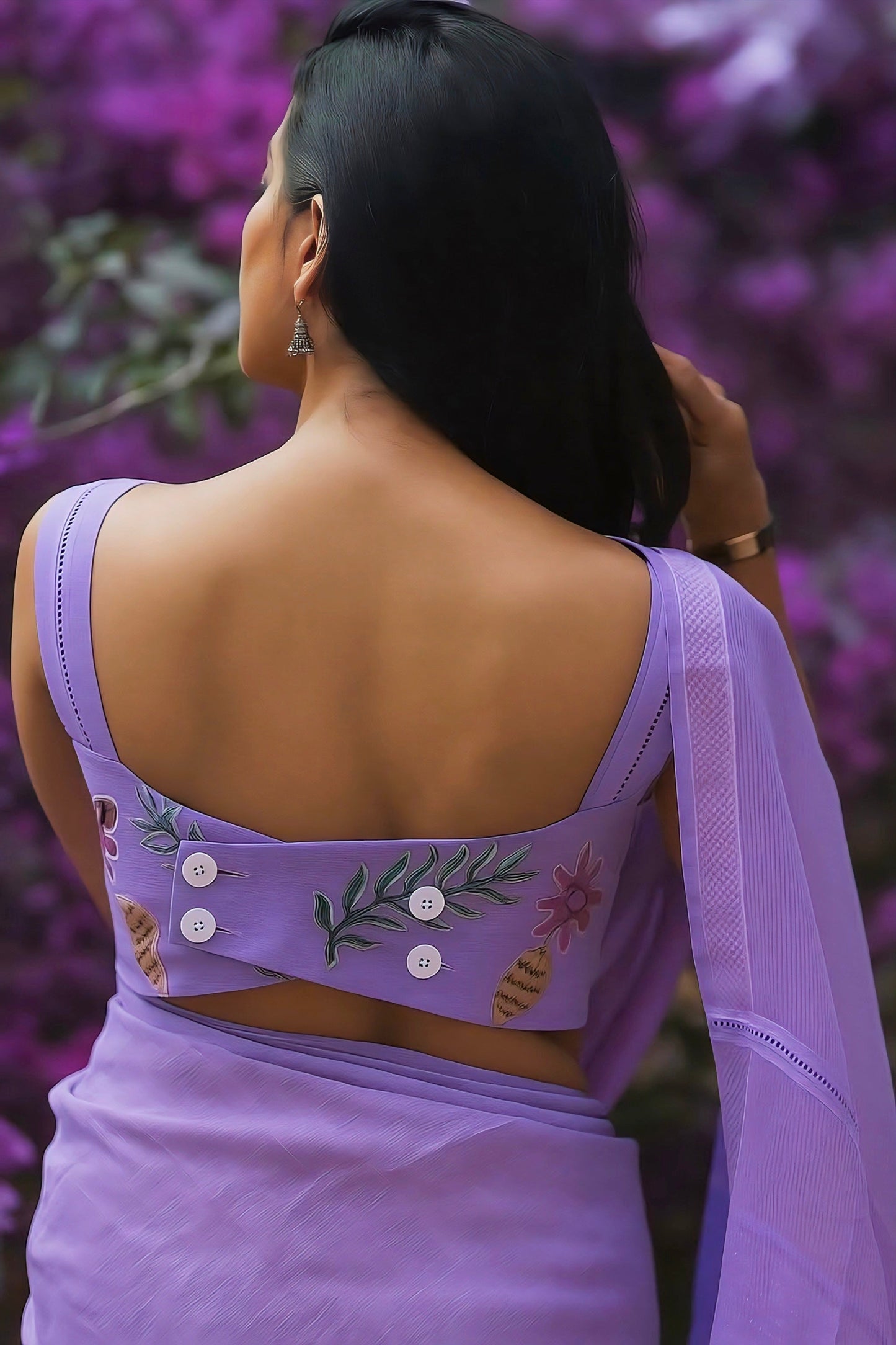 Lavender back neck blouse design with cross-panel style and white button details – elegant modern blouse inspiration.