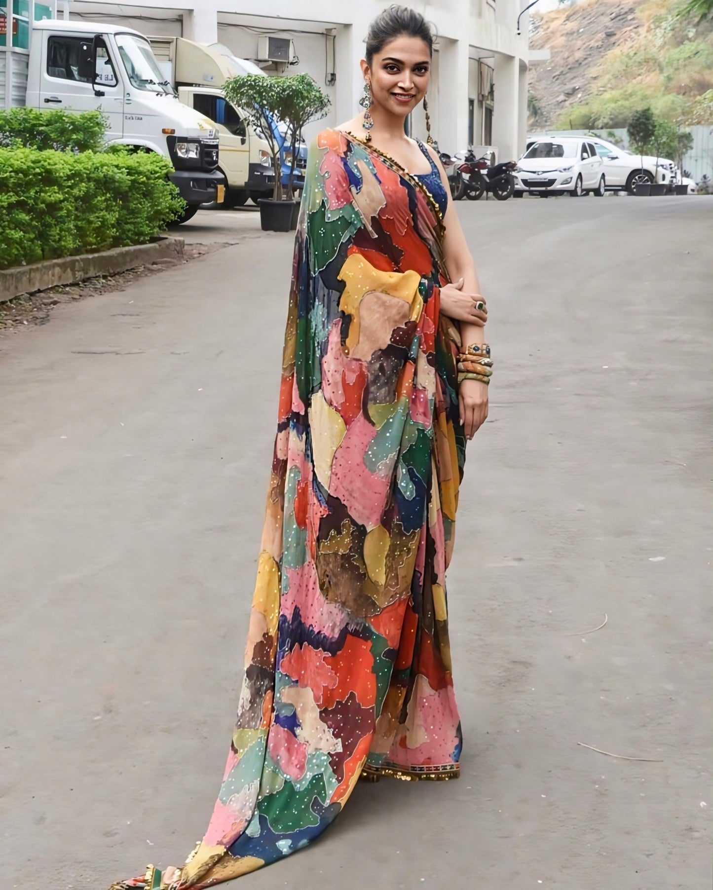 Celebrity inspired multicolor printed saree with bold artistic design