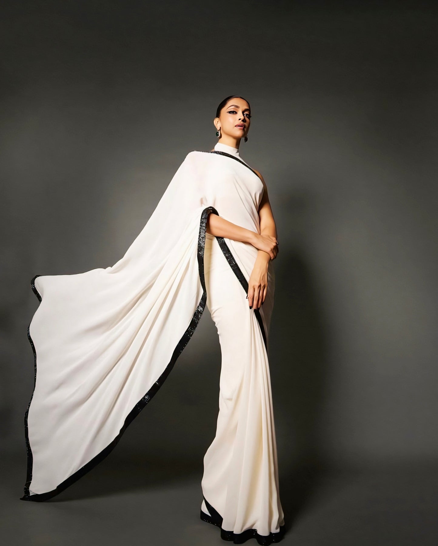 Deepika Padukone inspired white saree with black border and high-neck blouse
