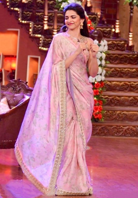 Pastel pink floral saree with sequin embellished border