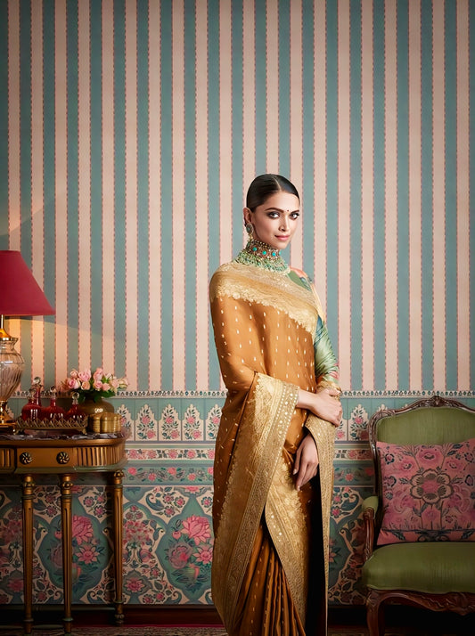 Deepika Padukone inspired mustard silk saree with gold zari work