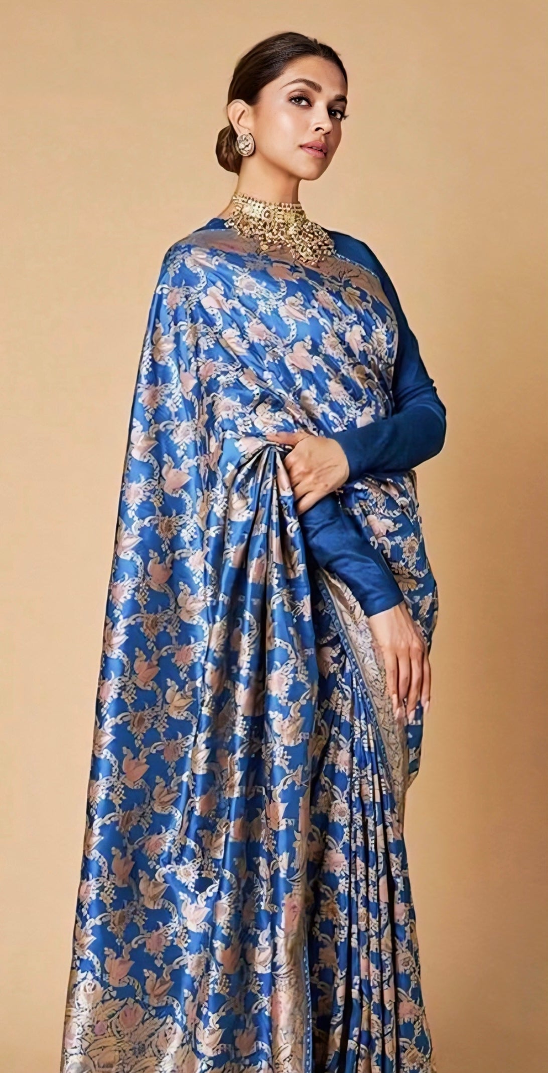 Royal blue Banarasi silk saree with floral zari design and celebrity-inspired styling