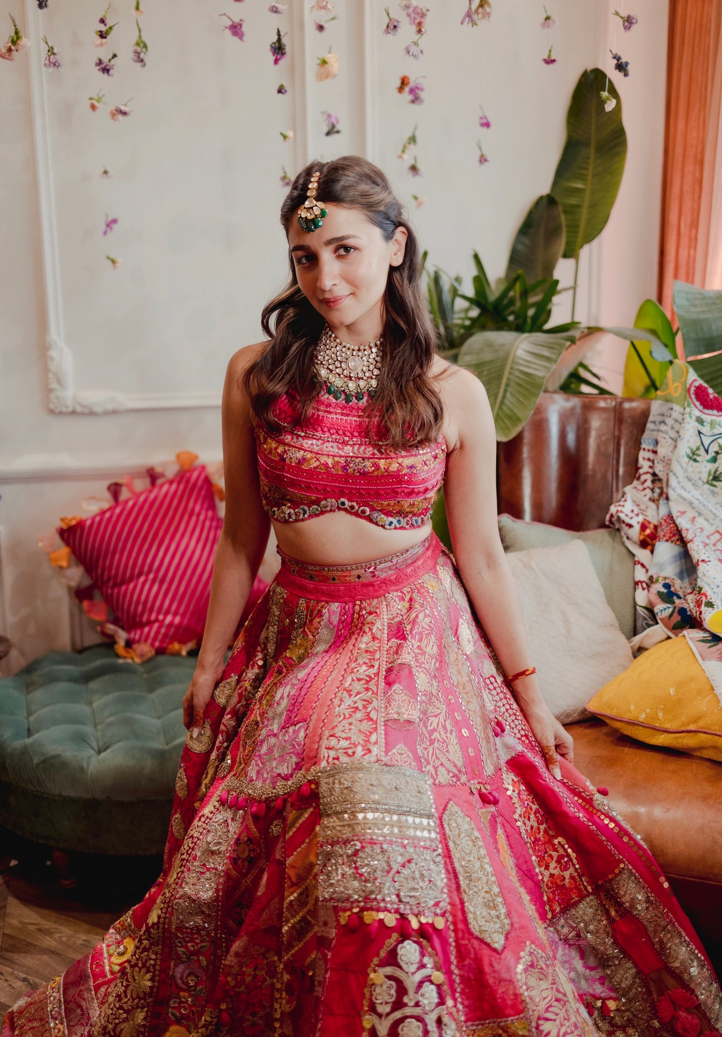 Pink mirror work patch embroidered lehenga with detailed blouse.