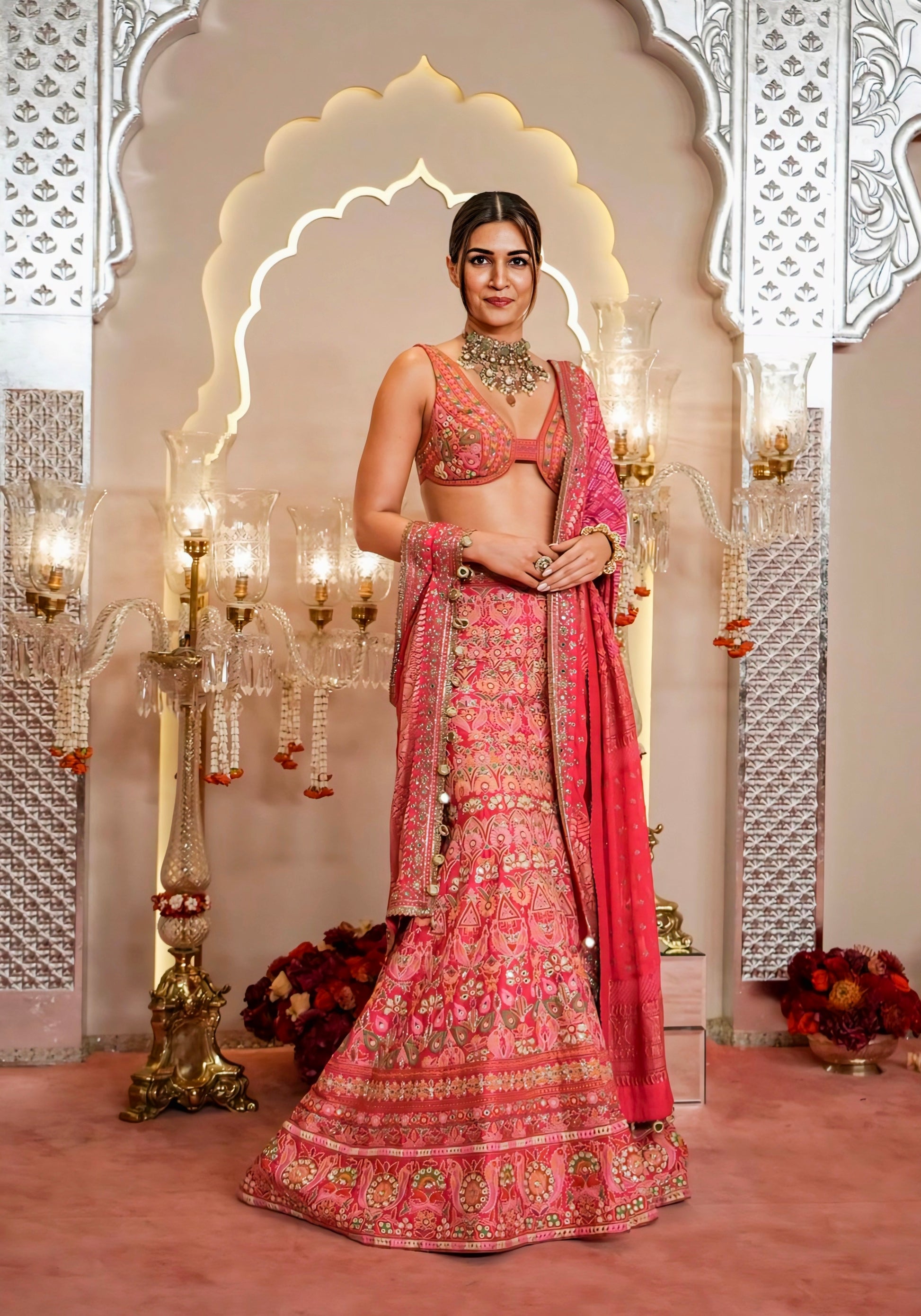 Kriti Sanon inspired coral pink embroidered lehenga with mirror work and designer blouse – Rimzim Fashion.