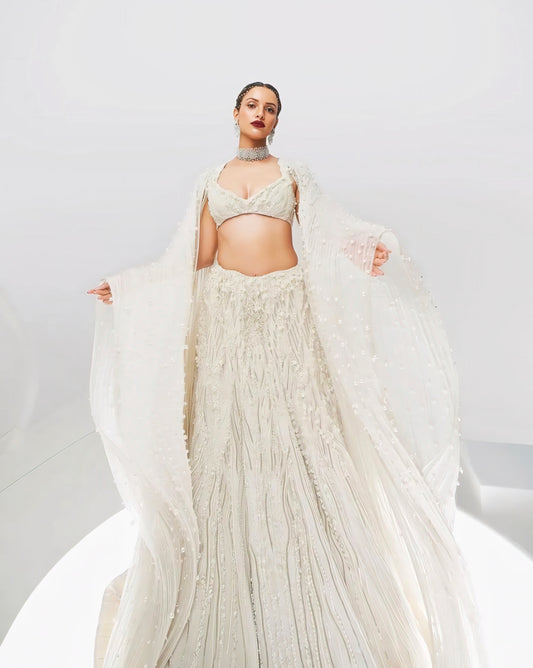Ivory white heavy embroidered designer lehenga choli with cape dupatta