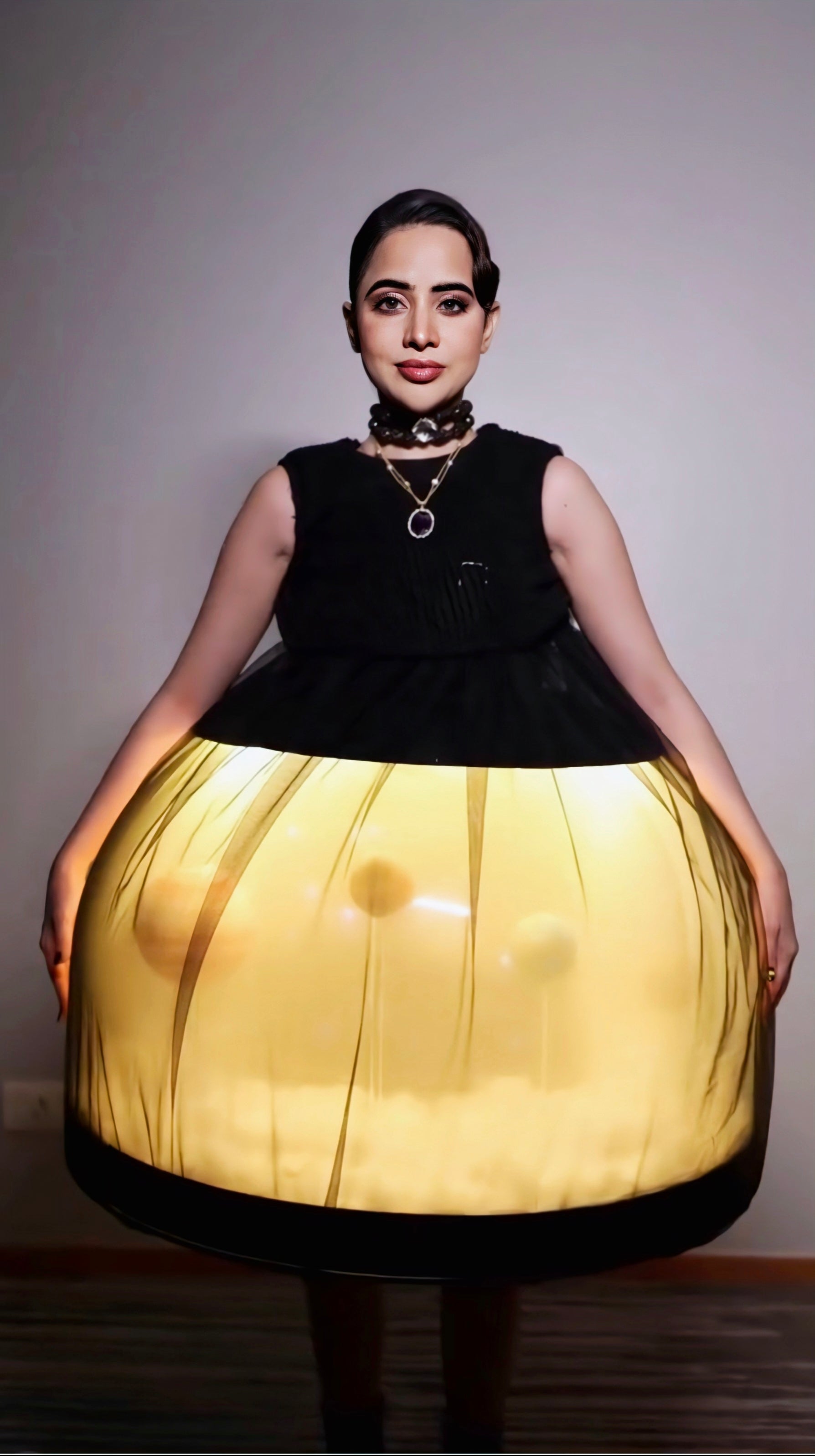 Urfi Javed inspired glowing experimental black and yellow couture dress