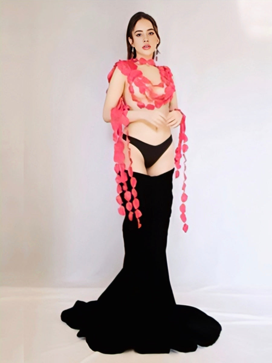 Urfi Javed outfit with cascading colored plastic spoons chest detail paired with black mermaid skirt bold couture look