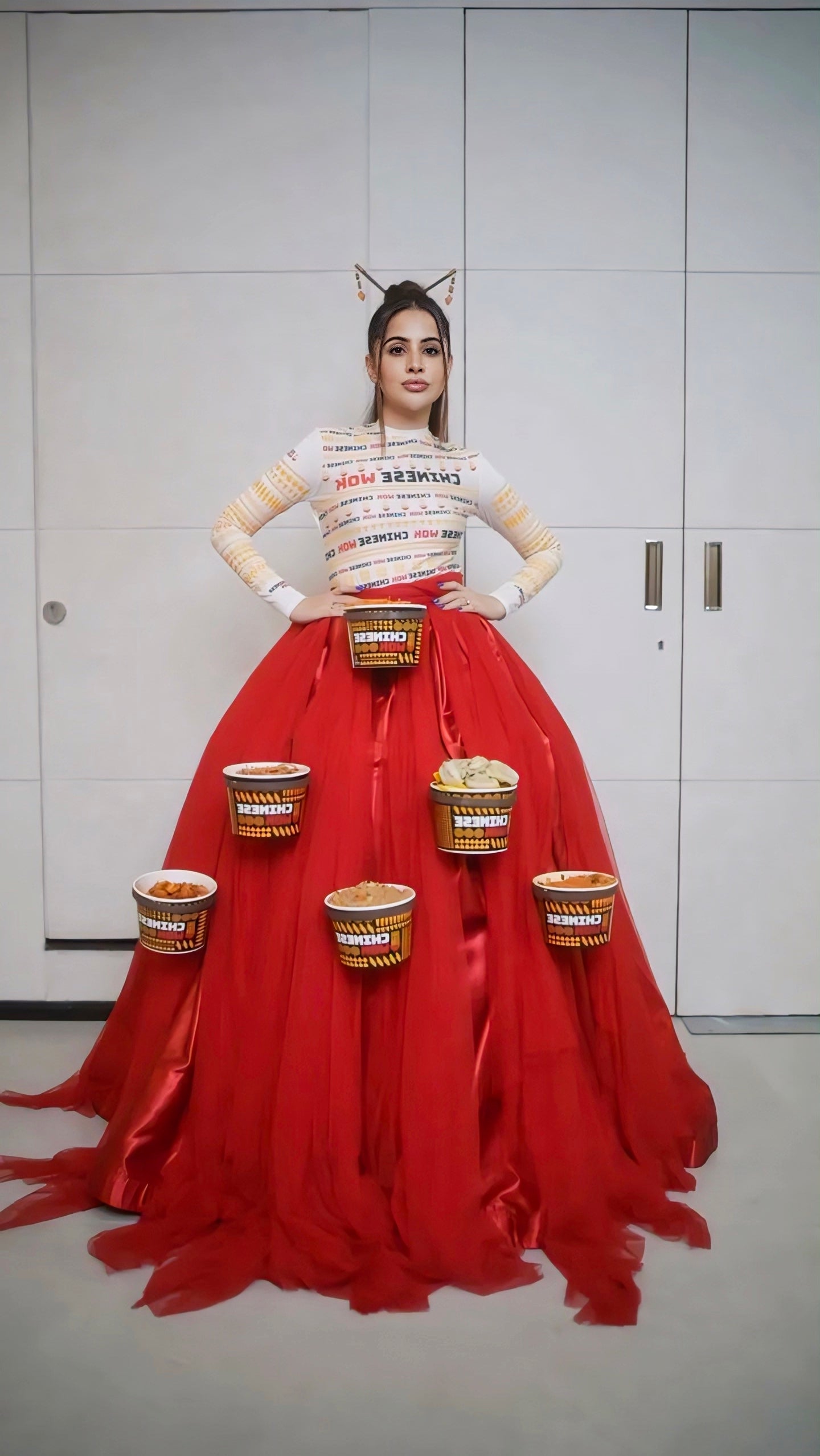 Urfi Javed red tulle skirt with Chinese takeout boxes and cat ears bold food couture fashion look