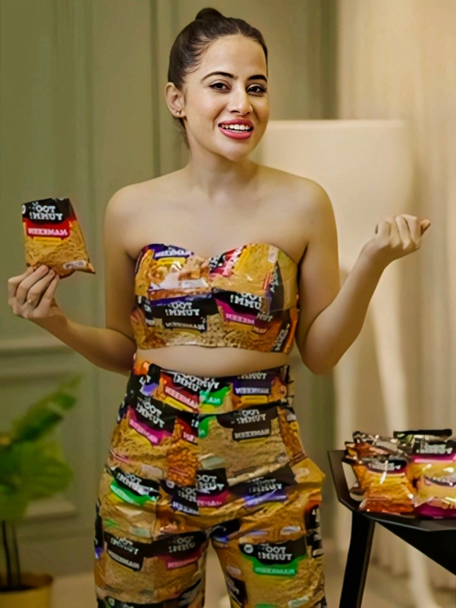Urfi Javed outfit made from Too Yumm Namkeen packets in yellow and red bold snack fashion couture look