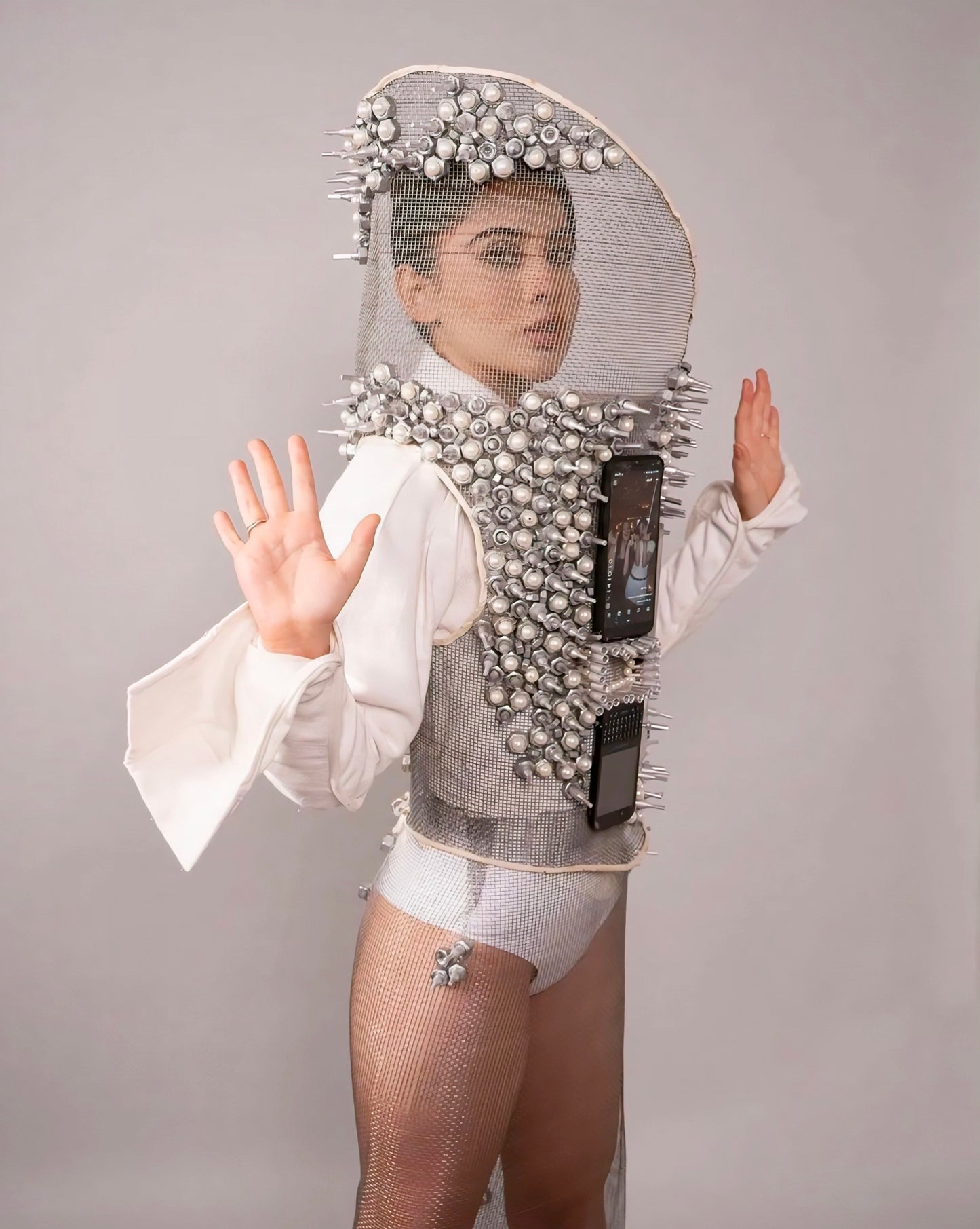 Urfi Javed Circuit Chic Outfit | Tech Mesh Couture with Mobile Elements