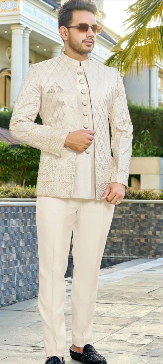 Engagement white dress for men featuring a designer embroidered jacket with tailored trousers for a luxury groom look