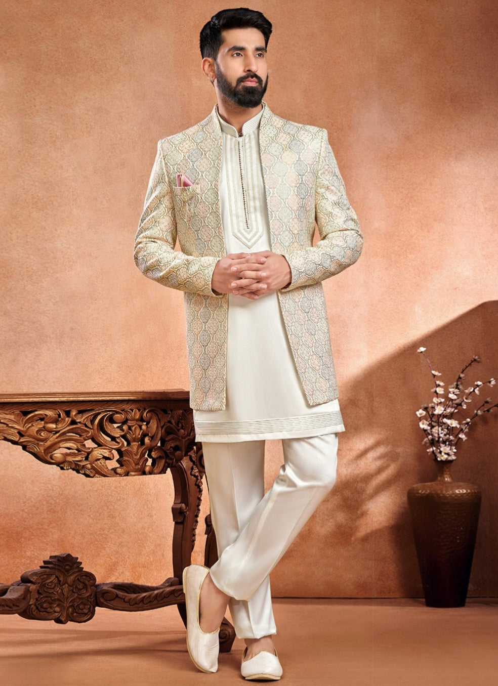 Engagement white dress for men with cream embroidered Nehru jacket and ivory kurta pyjama