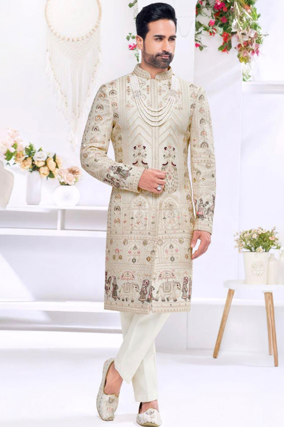 Engagement white dress for men featuring ivory embroidered kurta with traditional motifs