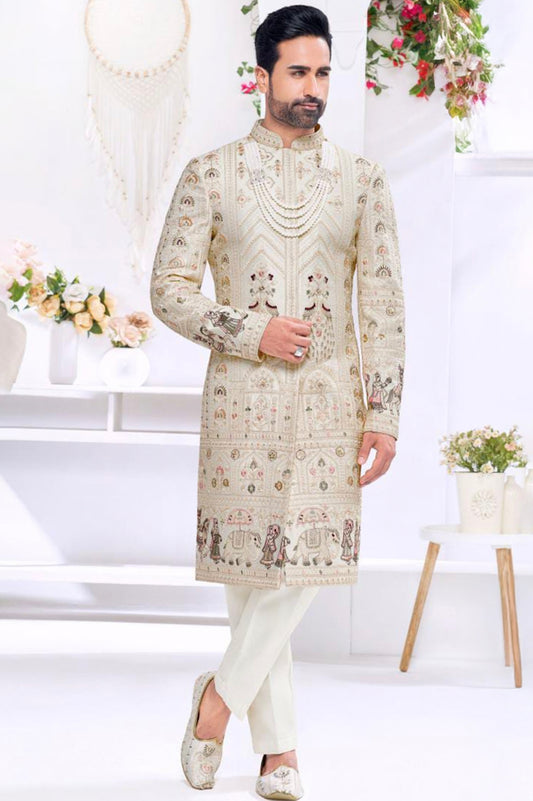 Engagement white dress for men featuring ivory embroidered kurta with traditional motifs