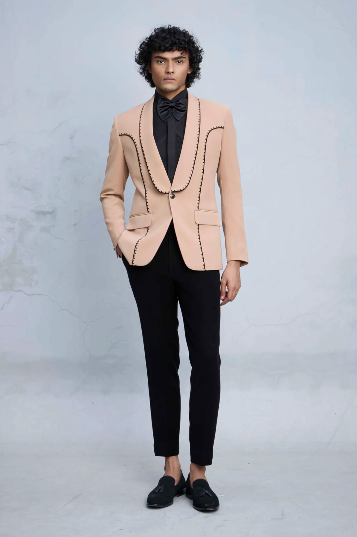 Peach Designer Tuxedo Suit for Men with Contrast Stitch Detailing & Black Lapel