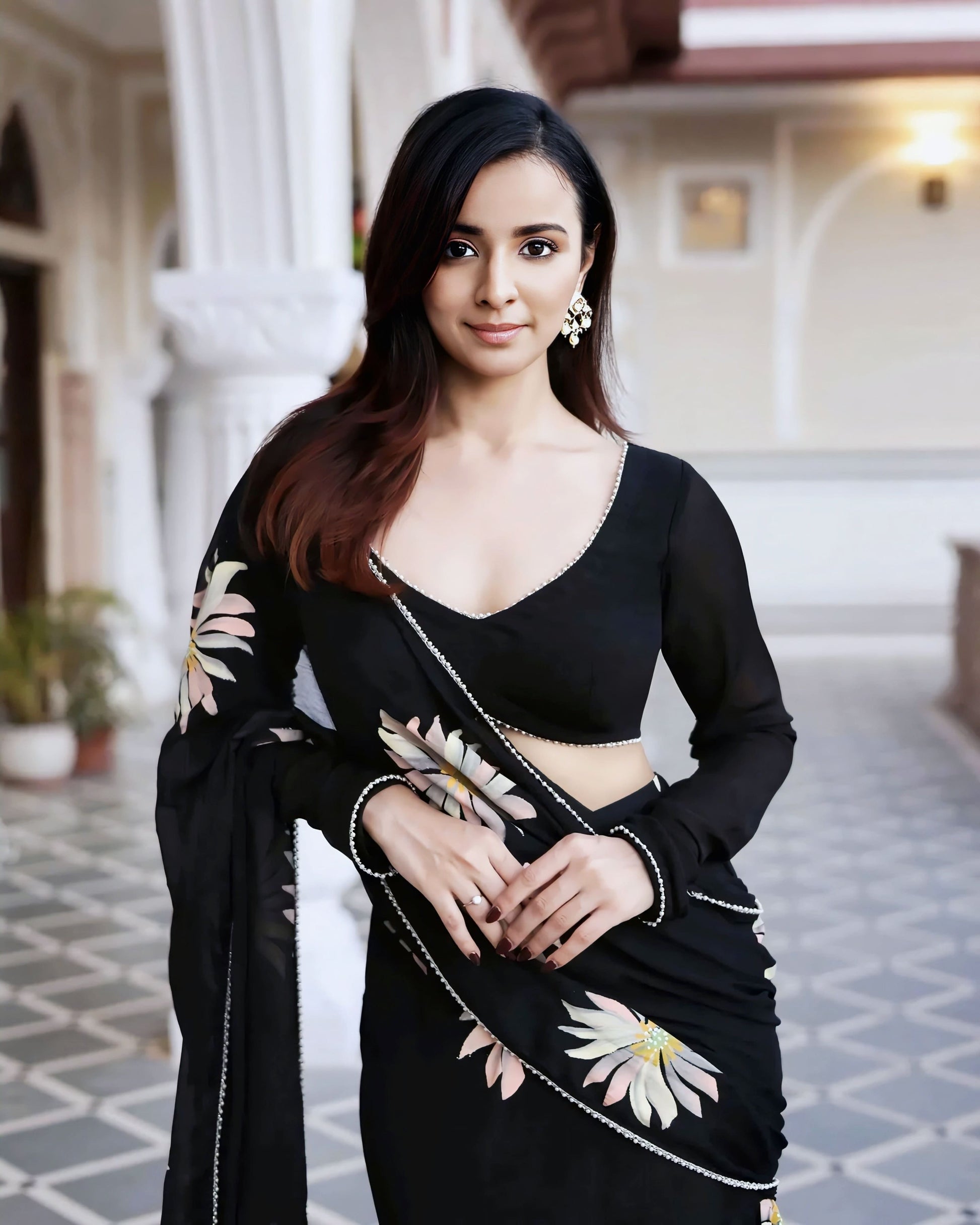 Black princess cut blouse with V-neck design and full length sleeves