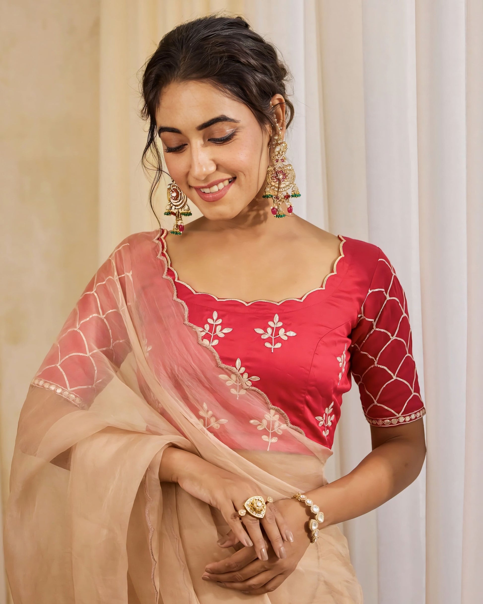 Rani pink princess cut blouse with scalloped neckline and net embroidered sleeves