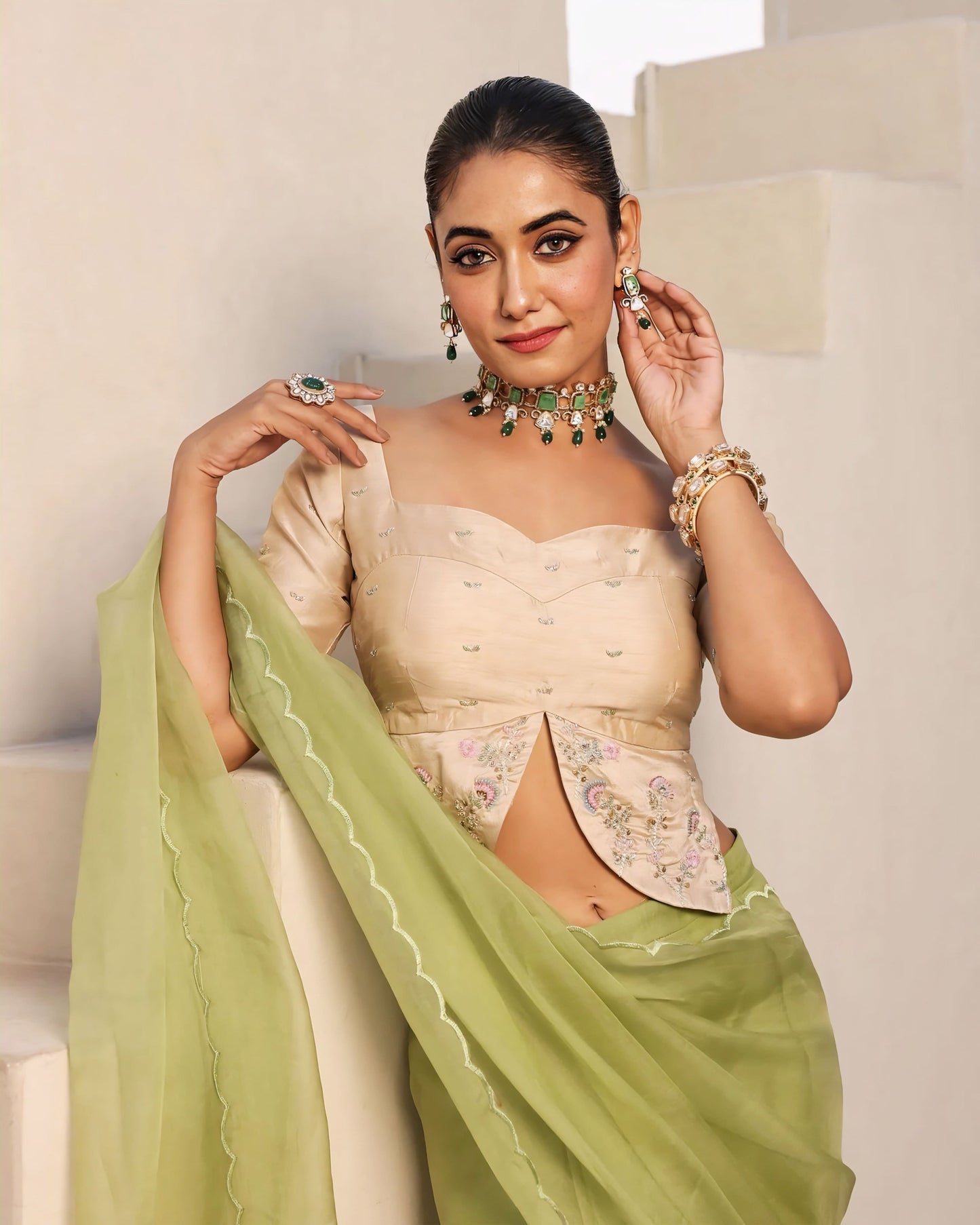 Champagne gold princess cut blouse with sweetheart neckline and floral embroidered front slit