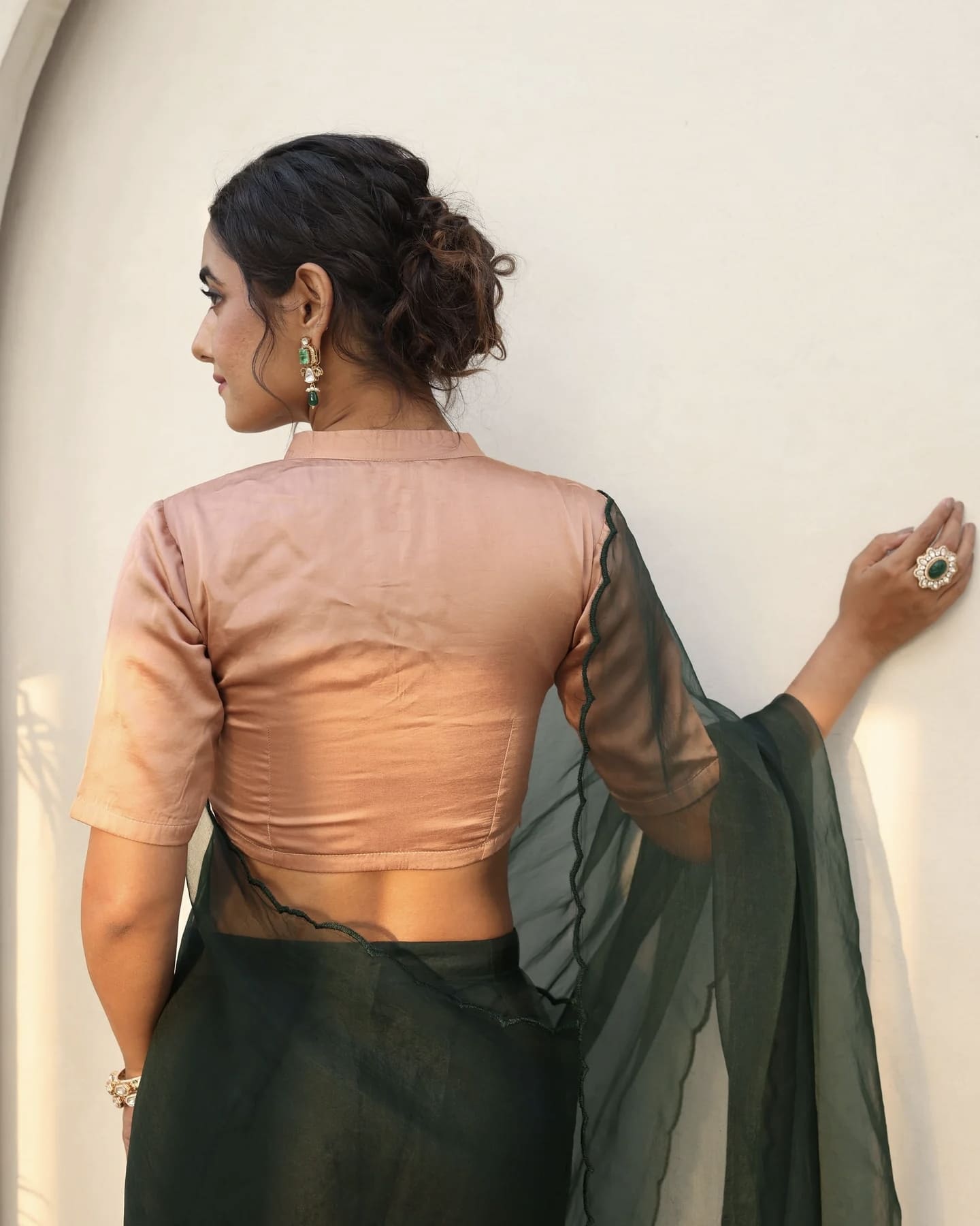 Peach Princess Cut Blouse with Notched Neck and Dark Green Sheer Pallu Finish