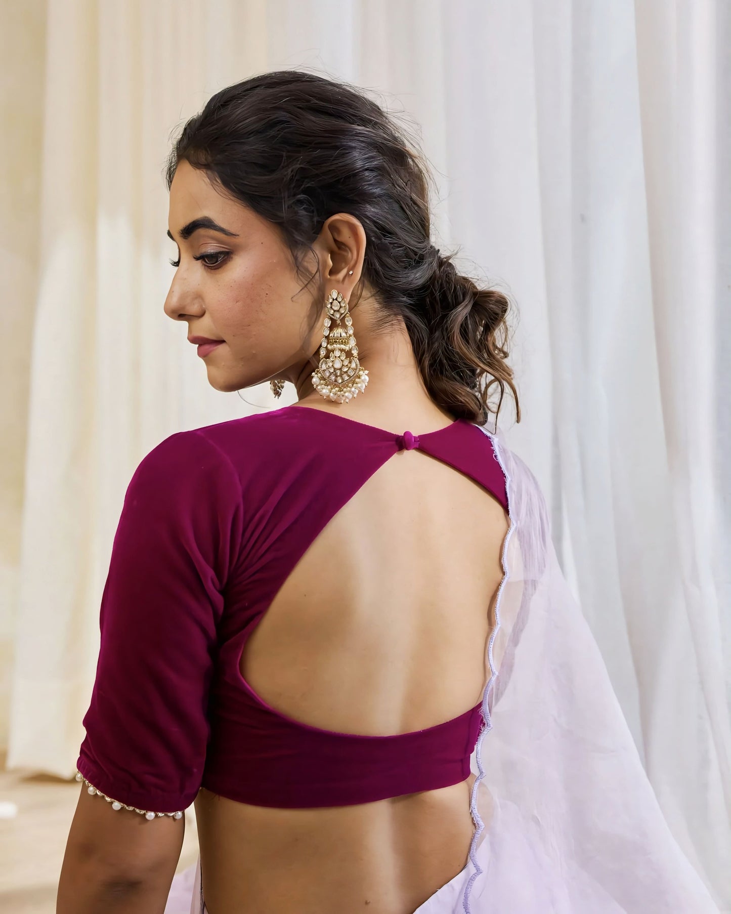 Wine Purple Designer Blouse with Round Neck and Pearl Embellished Sleeves