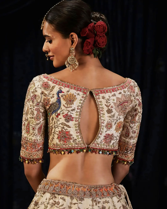 Ivory peacock embroidered back open designer blouse for bridal lehenga