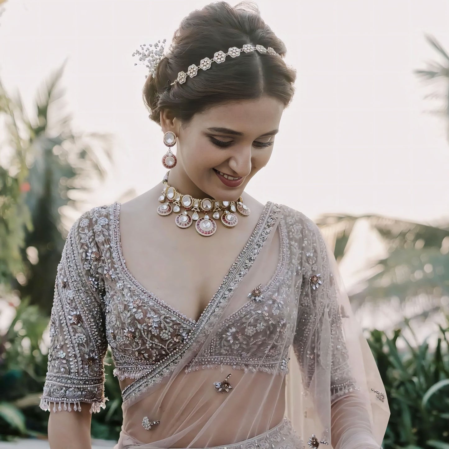 Taupe grey embroidered bridal designer blouse with sheer net sleeves and deep V neckline