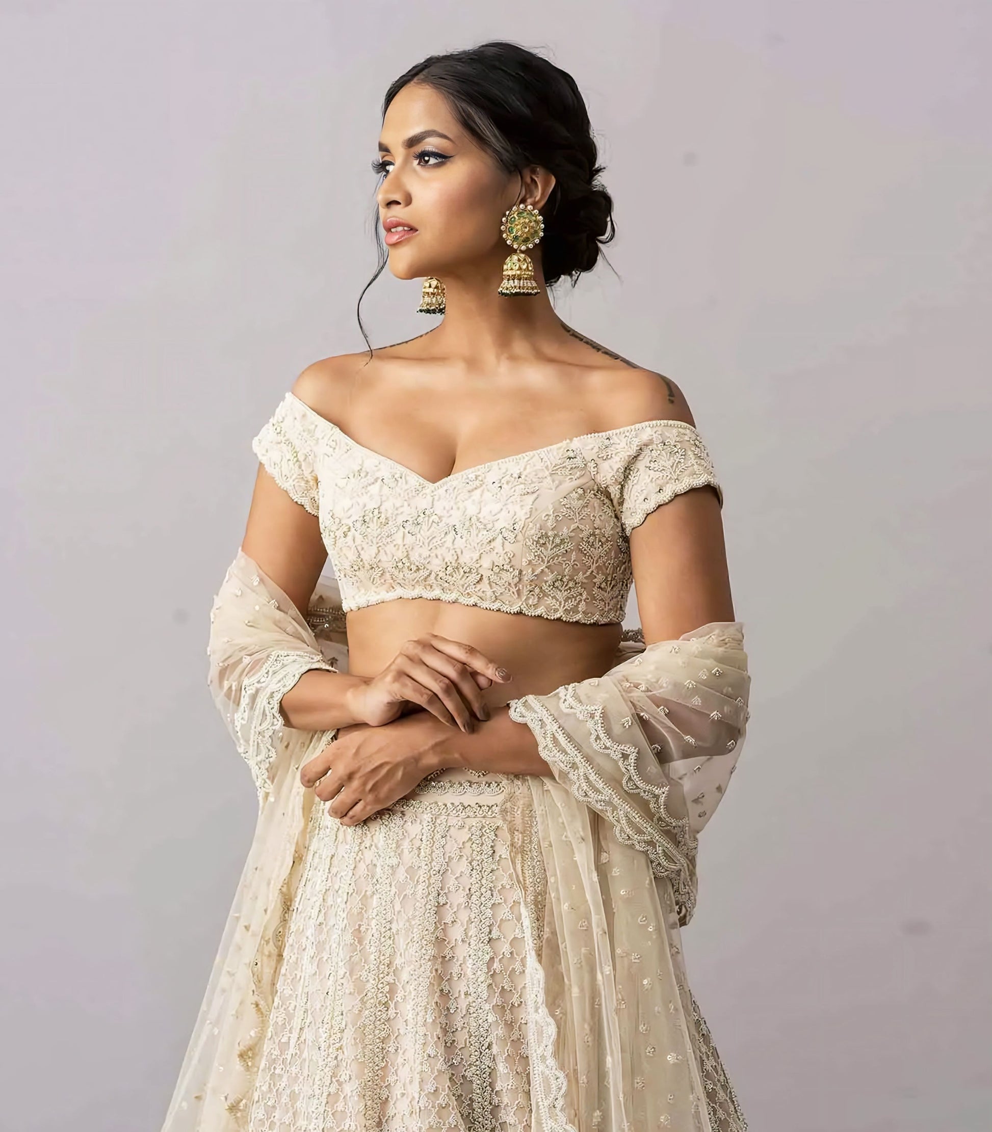 Ivory embroidered off-shoulder princess cut blouse with sweetheart neckline for wedding wear