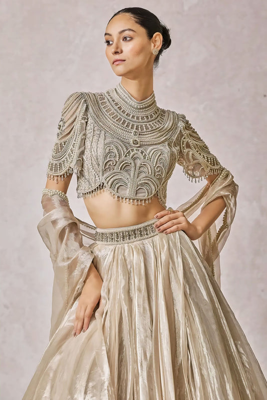 Ivory high neck embroidered blouse with pearl detailing and elbow length sleeves for bridal wear