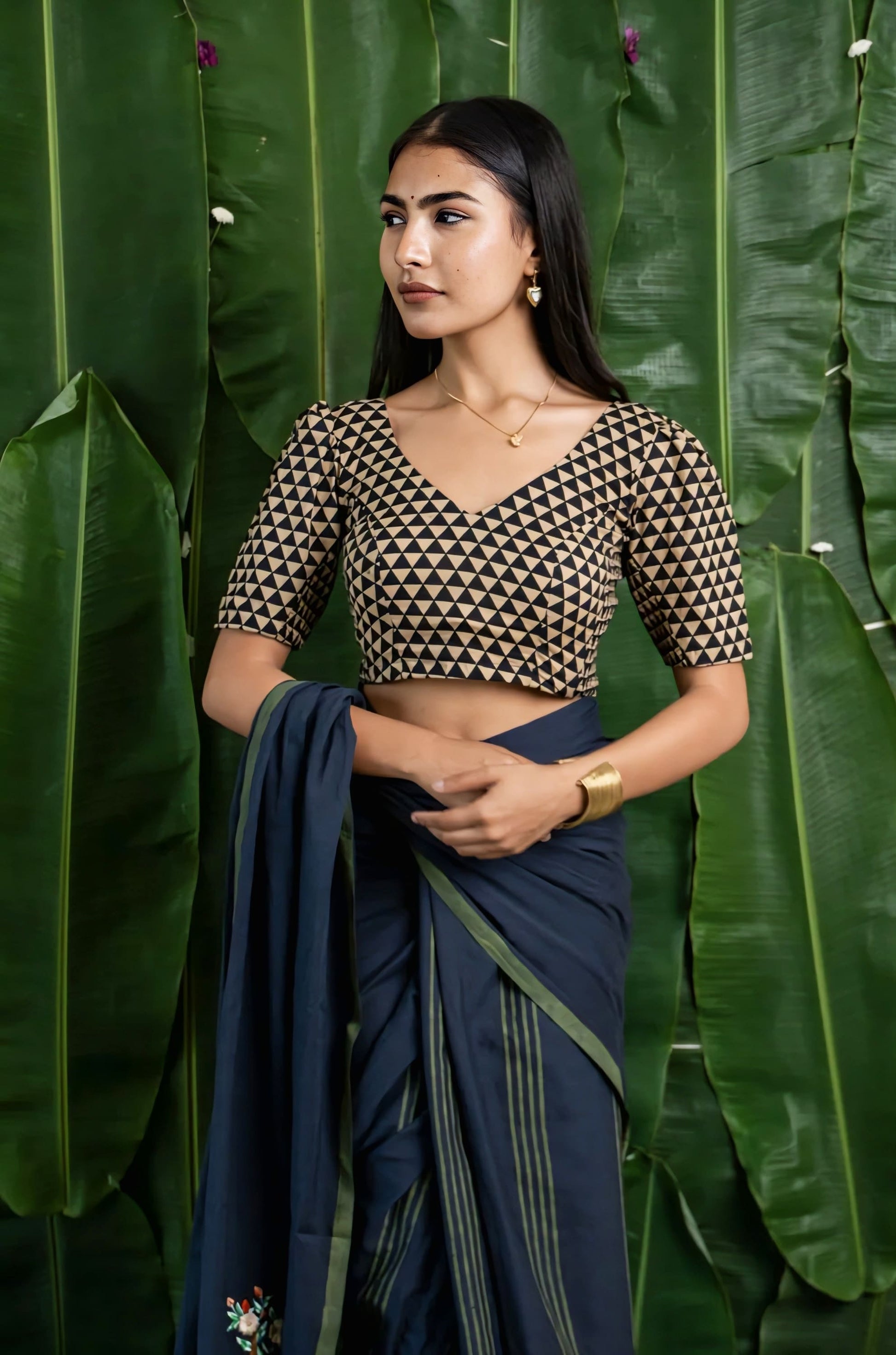 Black and beige geometric print fancy blouse design with V-neck and elbow sleeves