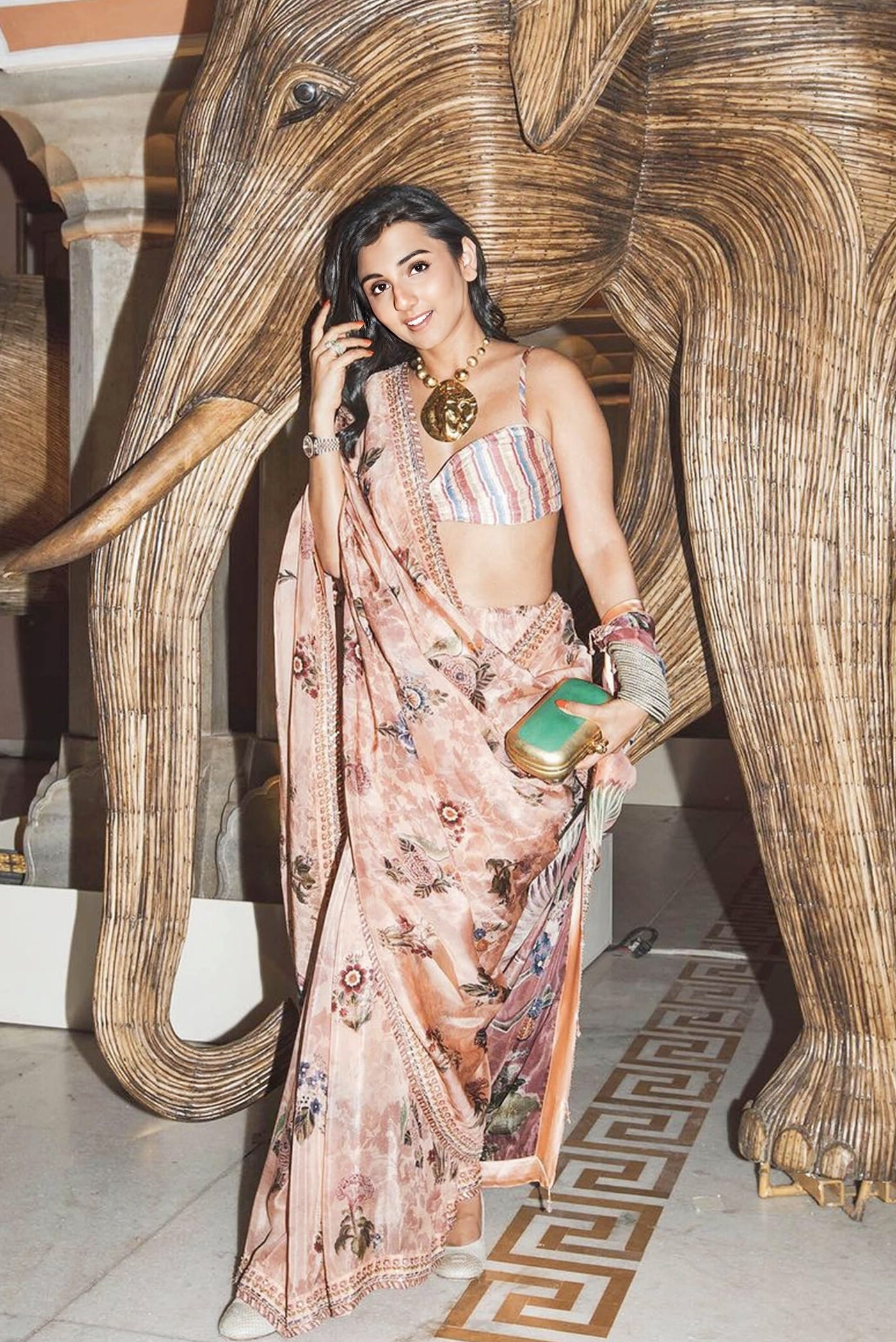 Masoom Minawala inspired peach Itra saree with floral and bird motifs in lightweight fabric for festive and elegant wear