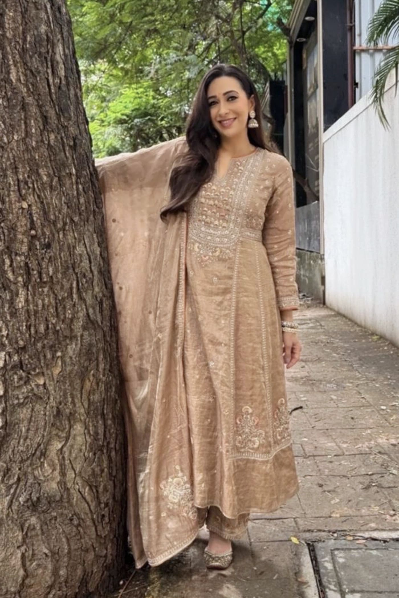 Karisma Kapoor inspired bronze tissue suit set with gota patti zari thread and sequin embroidery for festive wear