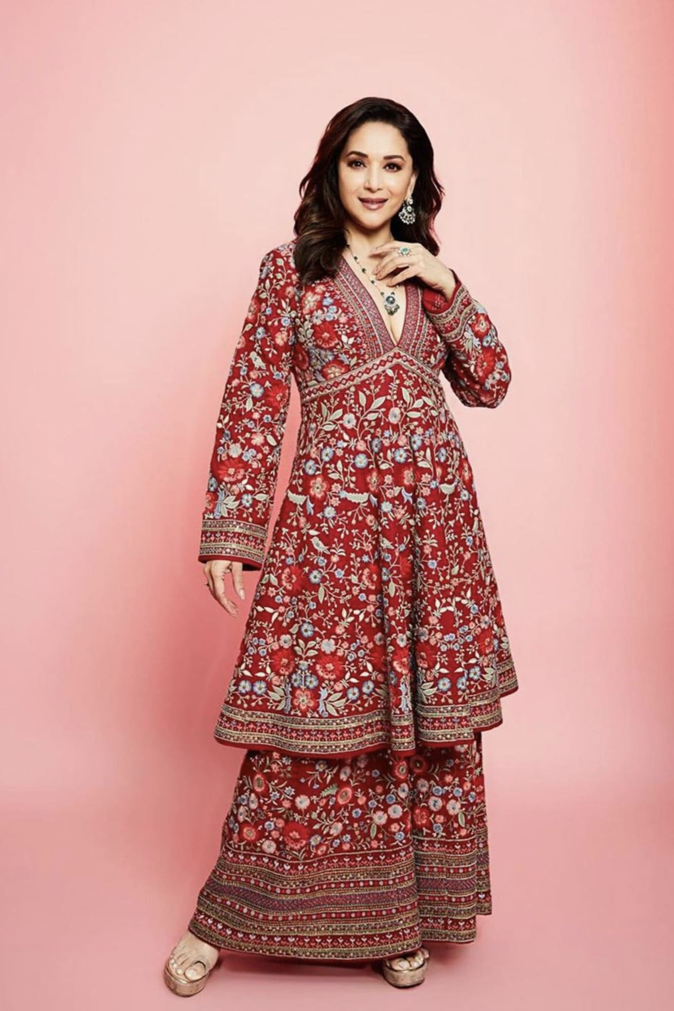 Madhuri Dixit inspired red silk kurta set with floral zardozi embroidery and modern neckline for festive wear