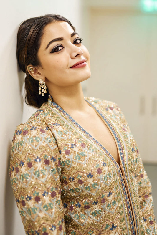 Rashmika Mandanna inspired blush silk jacket set with zardozi embroidery and sequins paired with palazzo pants for festive wear
