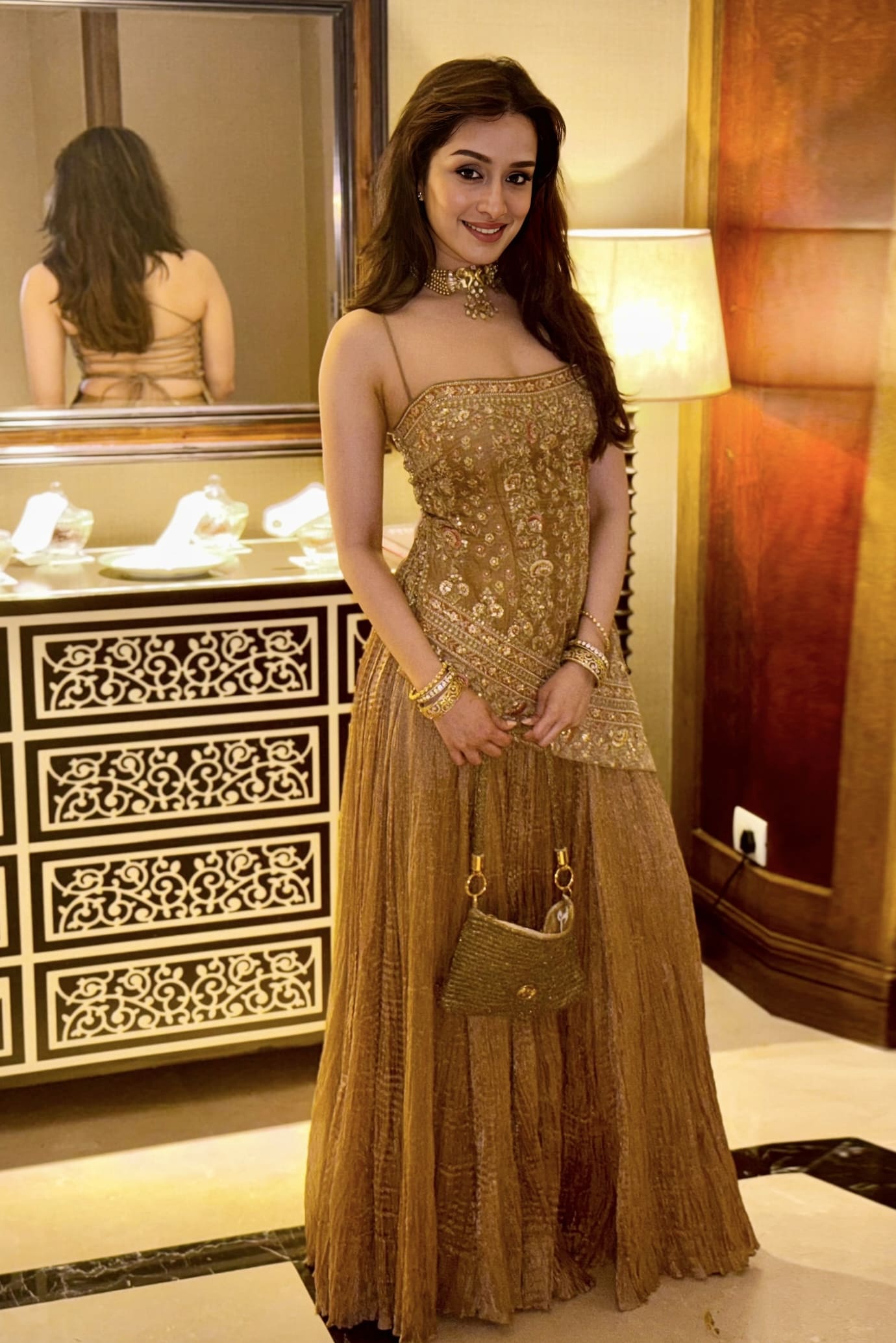 Shraddha Kapoor inspired gold sharara set with gota patti zari thread and sequin embroidery for festive wear