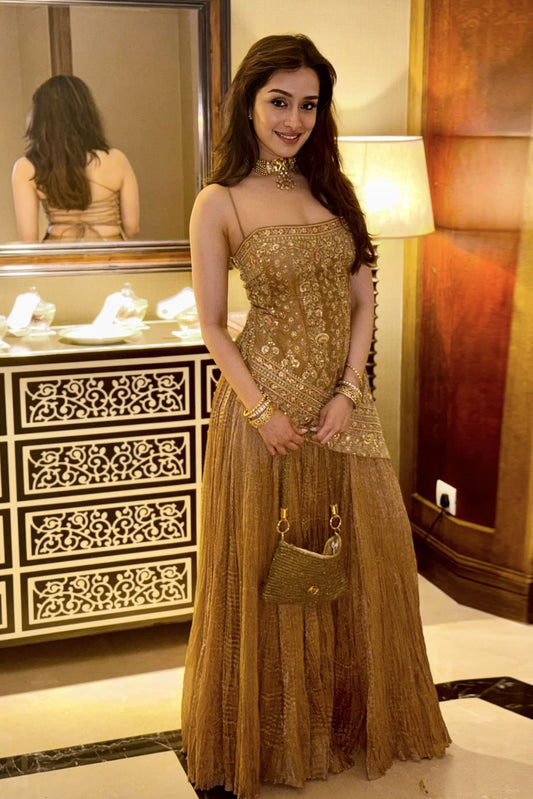 Shraddha Kapoor inspired gold sharara set with gota patti zari thread and sequin embroidery for festive wear