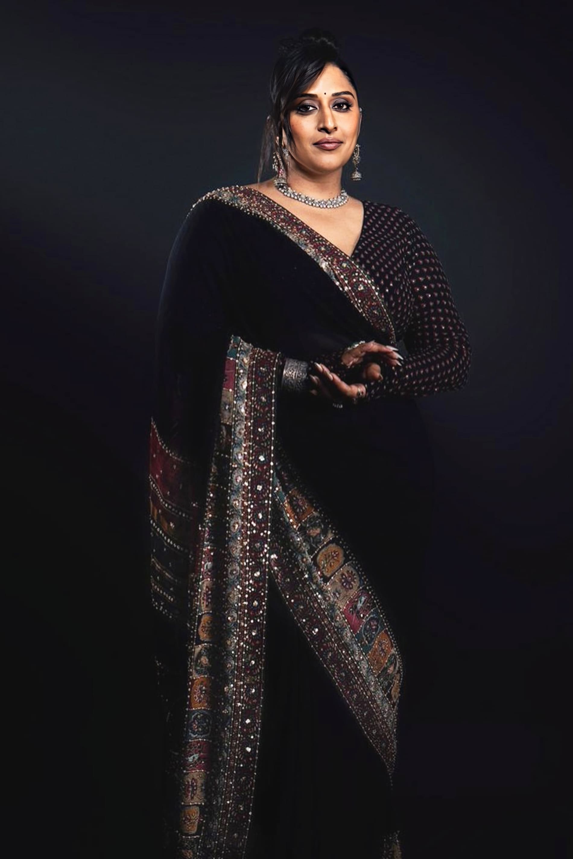 Raja Kumari inspired black sequin saree with palatial detailing for cocktail and evening party wear