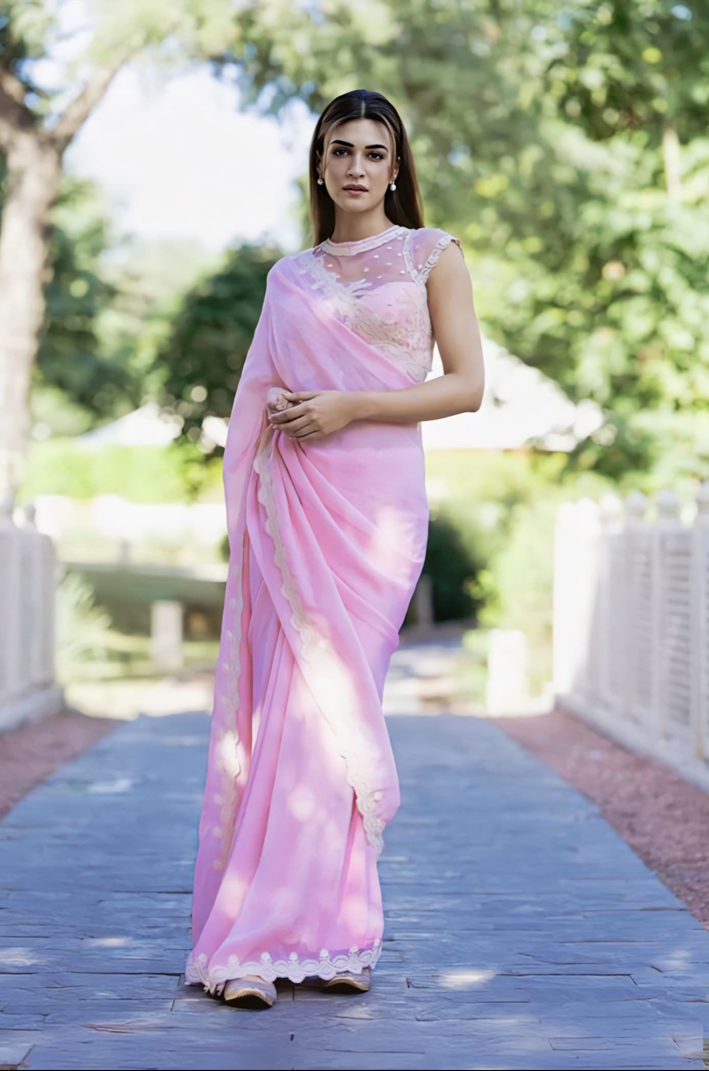 Kriti Sanon inspired pink georgette saree set with embroidered detailing net bralette and satin lycra underskirt