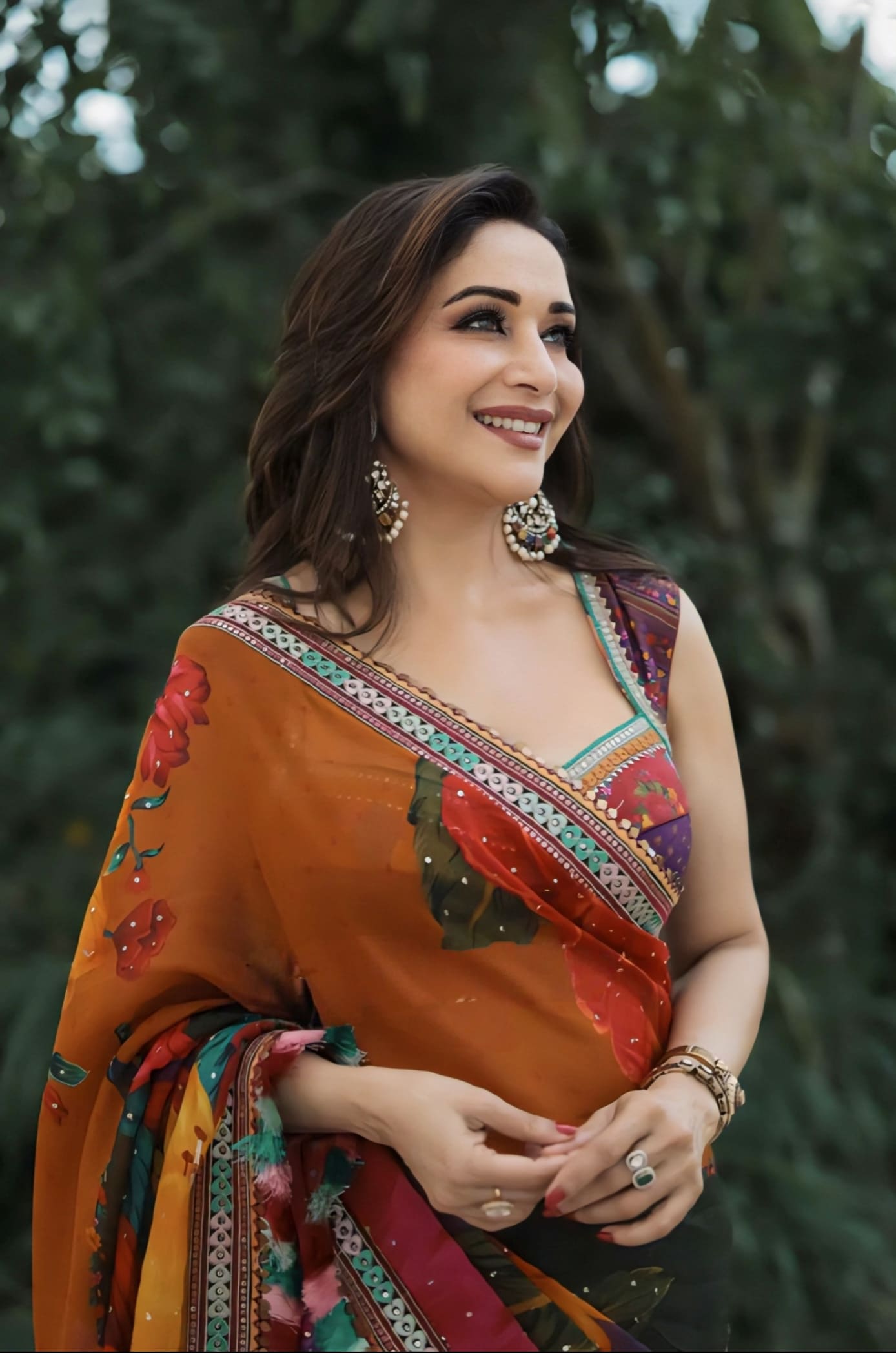 Madhuri Dixit inspired multicolour organza saree set with digital print and hand embroidery with silk blouse for festive wear