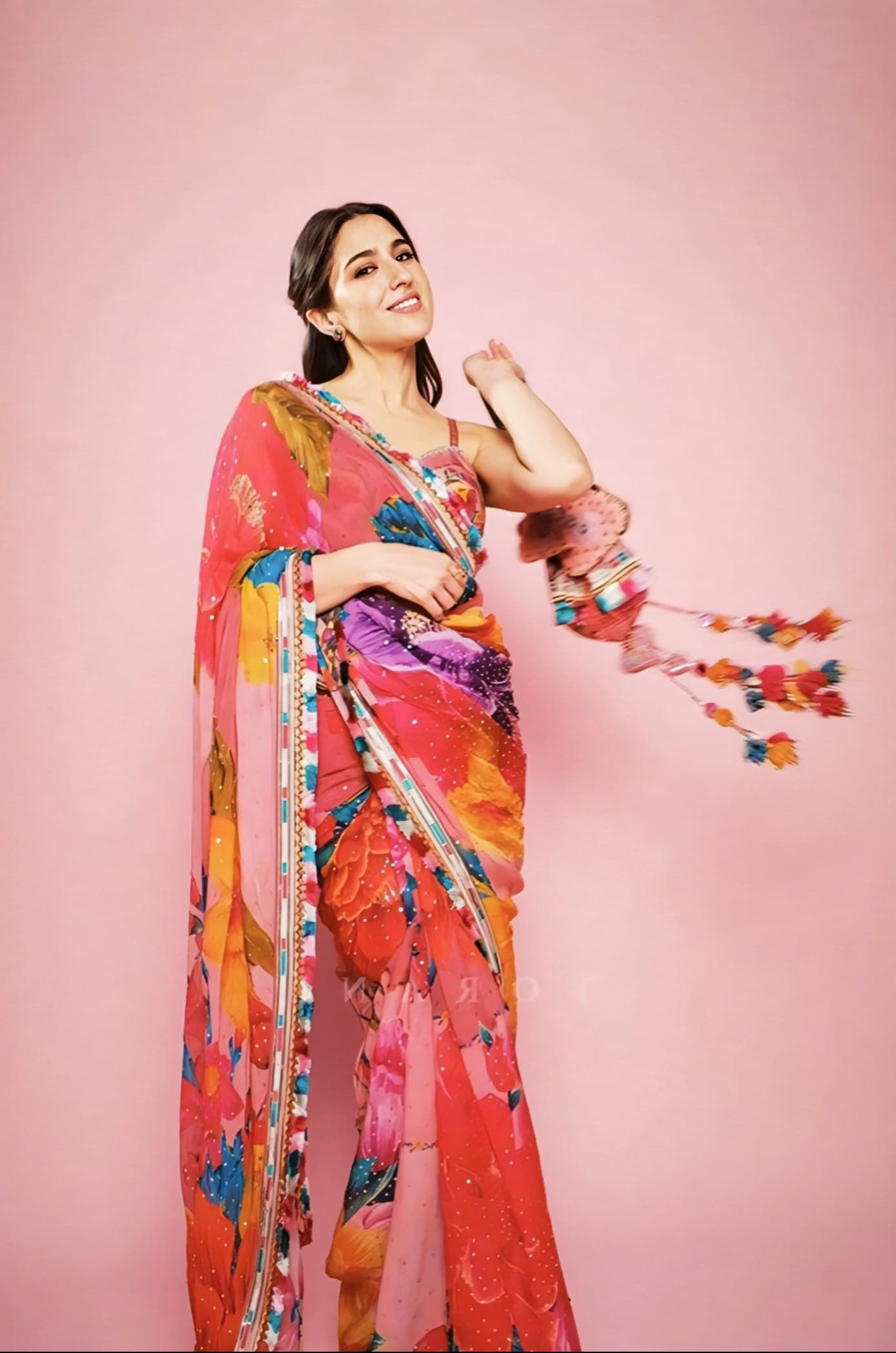 Sara Ali Khan inspired pink and multicolour organza saree set with digital print and sequin work with silk blouse for festive wear